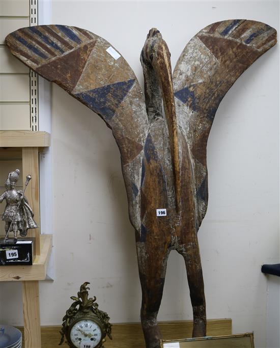 A large Senufo effigy carving of a standing bird height 127cm
